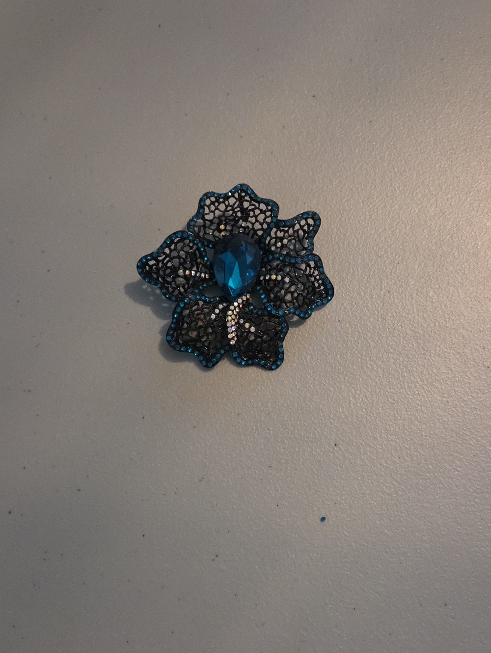 Vintage Black Filigree Flower Brooch Blue Rhinestone Statement Pin